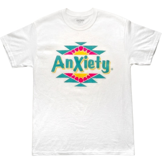 A white palm treat t-shirt featuring a colorful graphic on the chest with the word 'Anxiety' in teal and yellow, framed by a pink and teal geometric pattern.