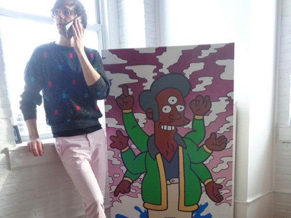 Marie Nolan Artist Hipster Palm Treat artist Jeff Nolan with psychedelic art painting of Simpsons cartoon character Apu on the phone with pink american apparel pants. 