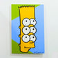 Bart vs the World with six eyes on a blue and green panel as photographed in the art and design studio North End Studios or NES in Detroit, MI. Acrylic psychedelic artwork Marie Nolan Art
